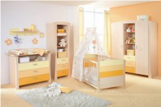 Yellow and white nursery girls bedroom