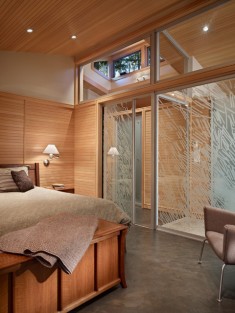Concrete panels and vertical wood slats bedroom wall textures