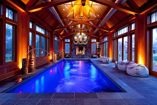 Swimming pool area with a fireplace