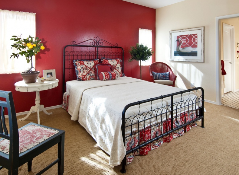 Black iron rod bed matches with the red colour