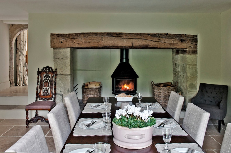 Chimney styled fireplace setting for the dining room