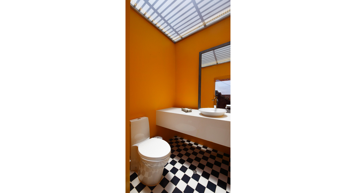 Bathroom with black and white floor tiles