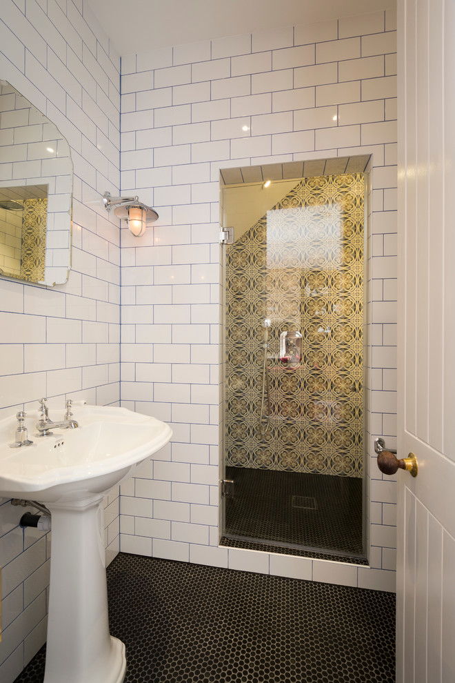 Tiled bathroom with a mirror