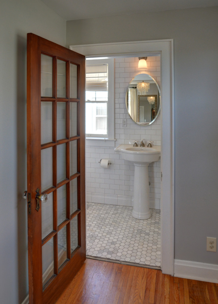 Bathroom with white colored subway tiles 