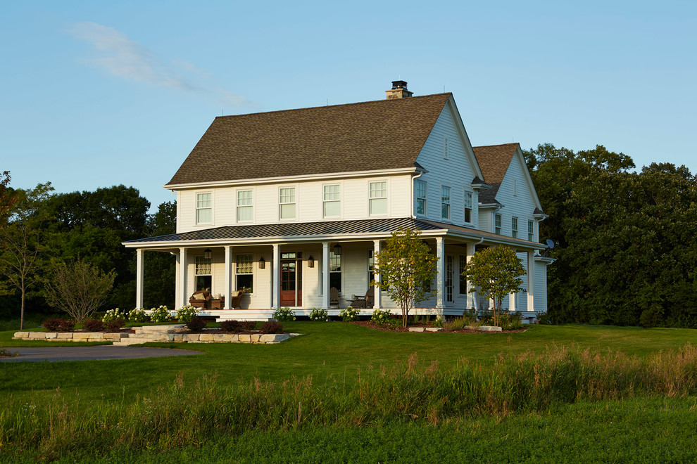 Farmhouse with a wide open porch