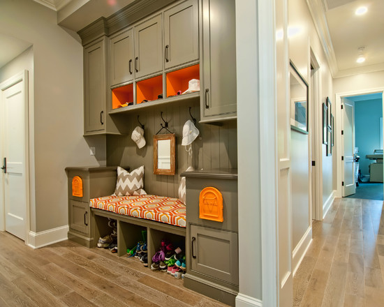 Mudroom with orange colored open shelves