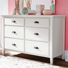 Bedroom With A White Chest Drawer